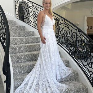 Gorgeous contemporary, white on white, lace wedding dress